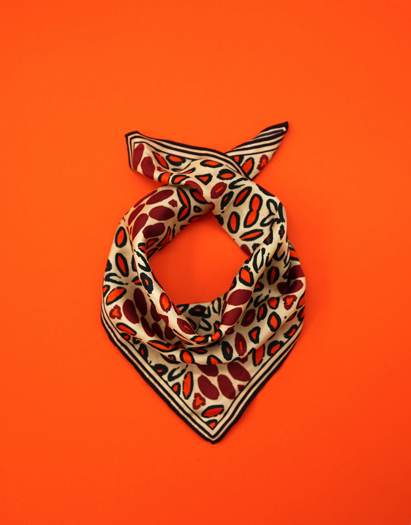 folded silk scarf with maroon and black orange florals