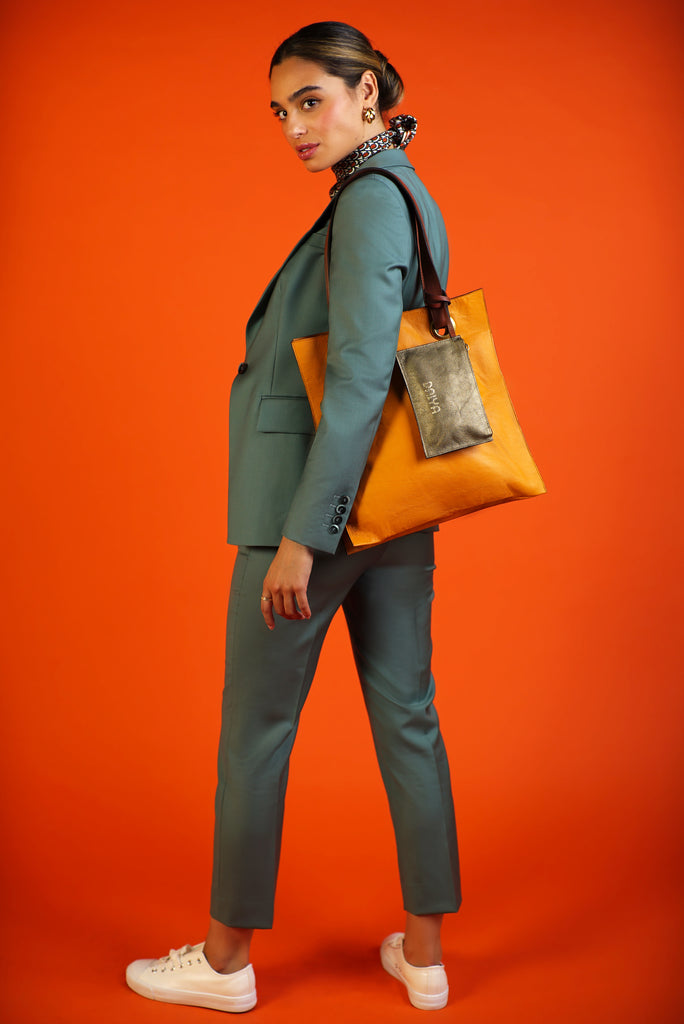 six interior compartments and laptop sleeve and detachable wallet