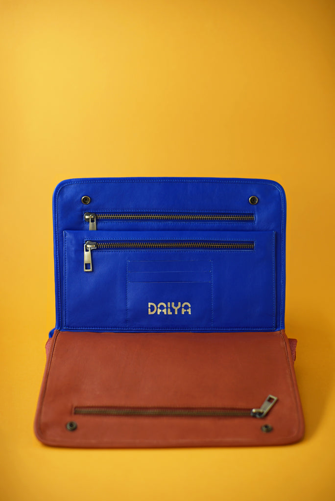 suede clutch with zippers and leather interior