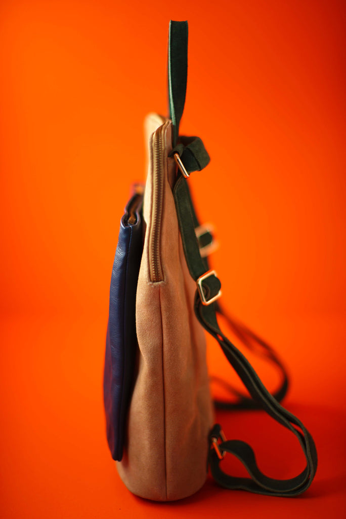 slim backpack with custom sand suede navy leather pocket and green suede straps